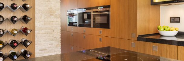 Kitchen with light wooden cupboards - Foto, Imagem