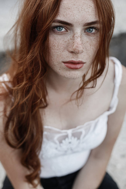 Beautiful redhead girl with blue eyes - Photo, Image