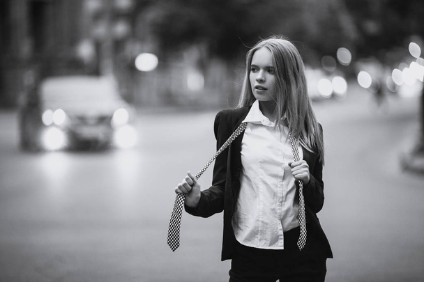Girl on city street in shirt and tie. - Фото, зображення