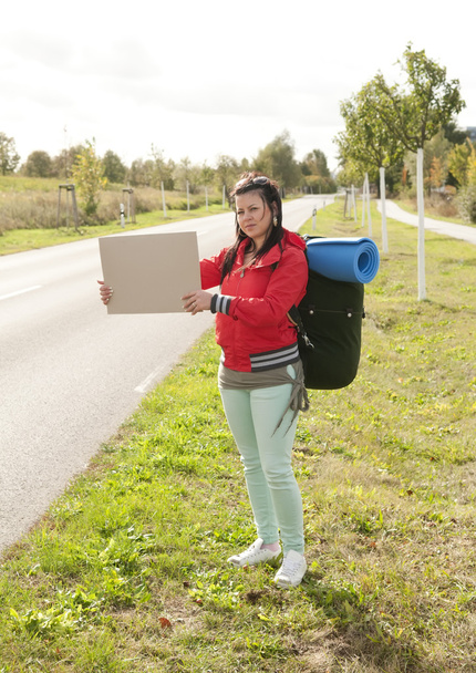 Hitchhiker with blank sign - Photo, Image