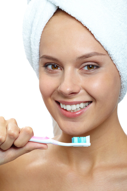 Femme avec brosse à dents
 - Photo, image