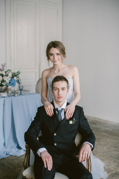 The beautiful newly-married couple. Bridal fashion. - Zdjęcie, obraz