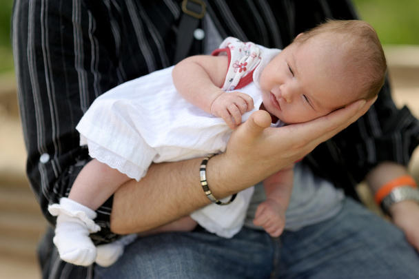 Little newborn baby in father's hands - Φωτογραφία, εικόνα
