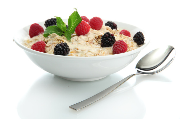 tasty oatmeal with berries, isolated on white - Foto, immagini