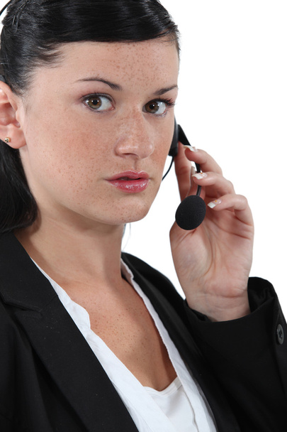 Businesswoman with a headset - Photo, Image