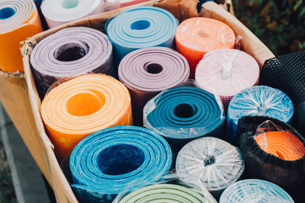 colorful yoga mats,sale of yoga mats. Film effect,unfocuset - Photo, Image