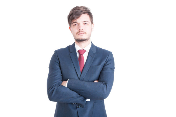 Business man looking sad posing with arms crossed - Photo, Image