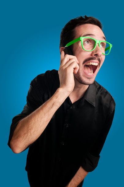 Man screaming at the telephone - Photo, Image