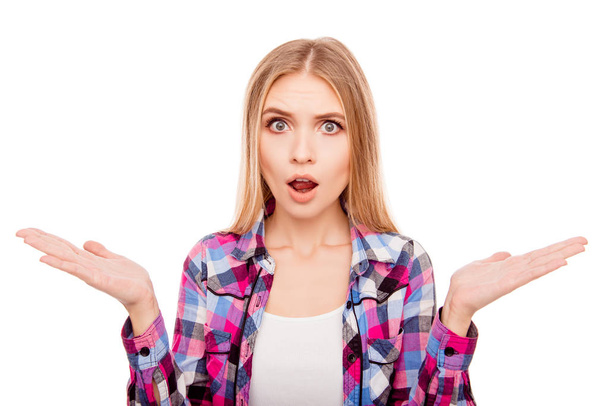 Shocked woman with open mouth gesturing with hands - Photo, Image
