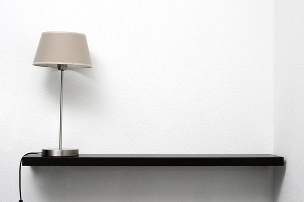 Shelf on the wall with lamp - Photo, Image