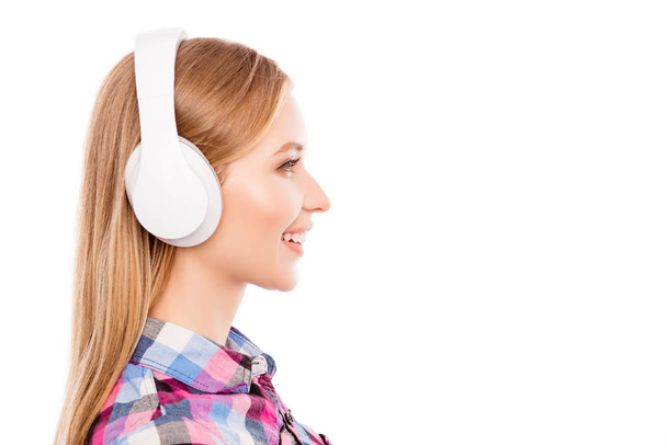 Side view of happy pretty blonde woman  in headphones - Photo, image