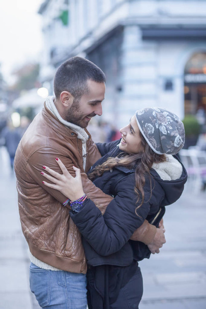 Young couple in love in the city walks - Valokuva, kuva
