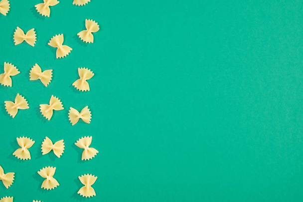 Farfalle pasta flat lay pattern - Foto, imagen