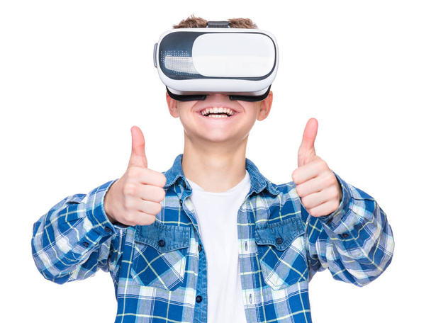 Teen boy in VR glasses - Foto, imagen