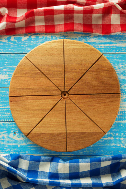 pizza cutting board at wood - Fotoğraf, Görsel