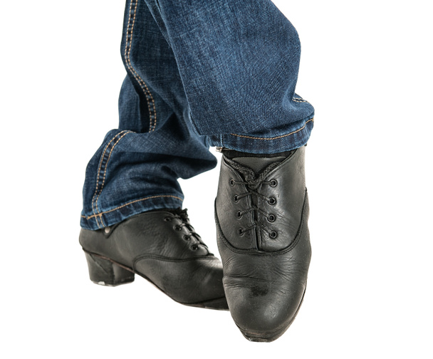 Irish dancer feet in black shoes isolated - Photo, Image