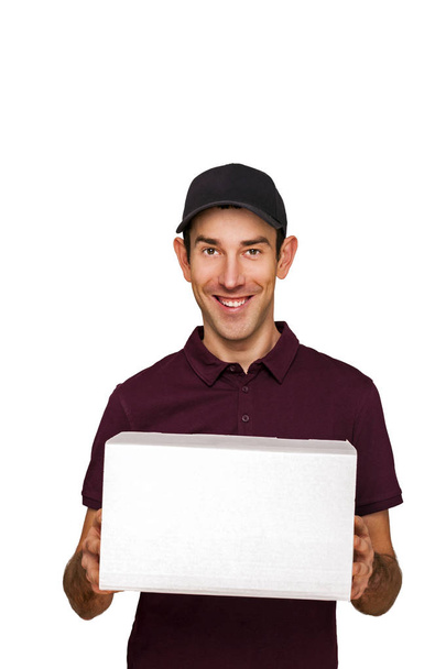 Delivery man with boxes isolated over white background. - Zdjęcie, obraz