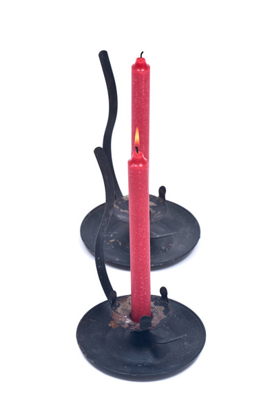Czerwona świeca w czarny Świecznik vintage - Zdjęcie, obraz