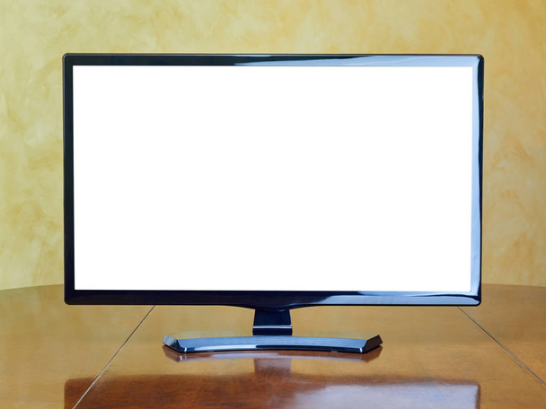 Blank screen TV monitor on the table - Photo, Image
