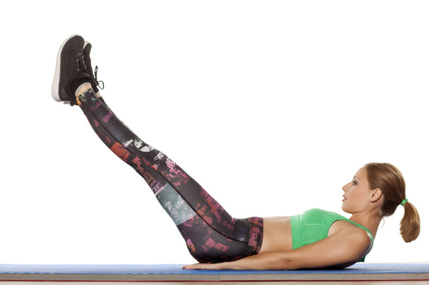  woman doing fitness exercises - Zdjęcie, obraz