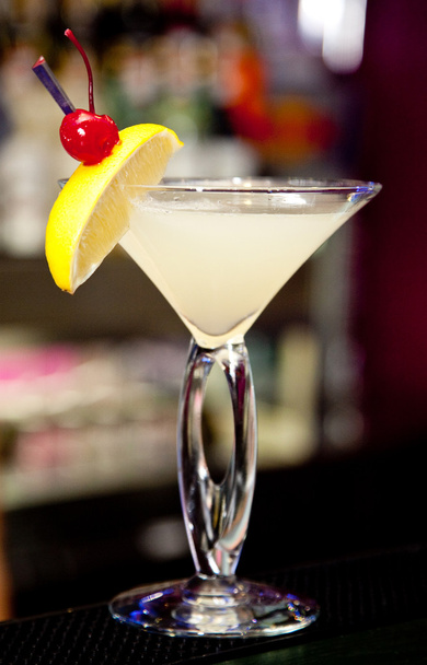 Cocktail in a glass on a napkin - Фото, зображення