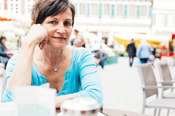 Senior Woman Enjoying A Cup Of Coffee, Tuebingen, Germany - 写真・画像