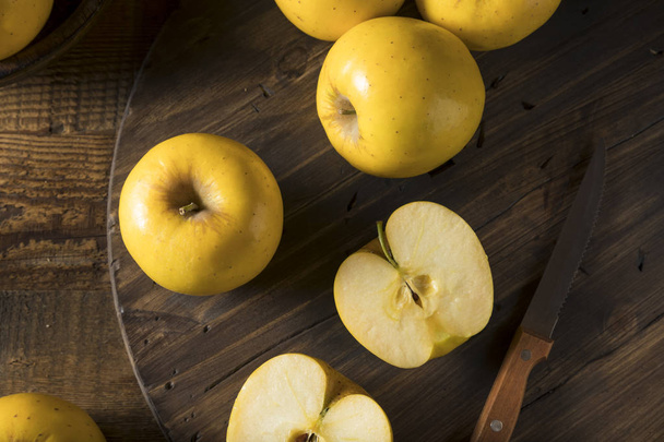 Raw Yellow Organic Opal Apples - Photo, image