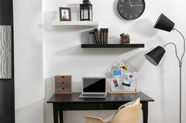 Workplace with laptop on table   - Valokuva, kuva