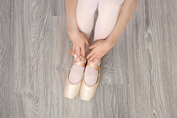 Legs of ballerina in ballet shoes - Foto, imagen