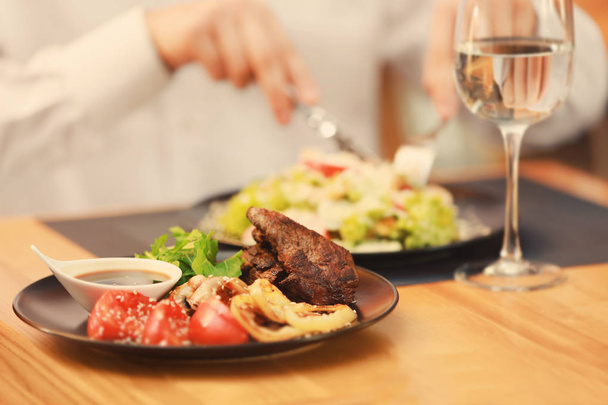 Plate with tasty meat - 写真・画像