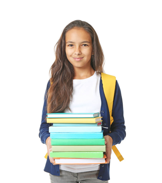 Cute schoolgirl with books   - Foto, Imagen