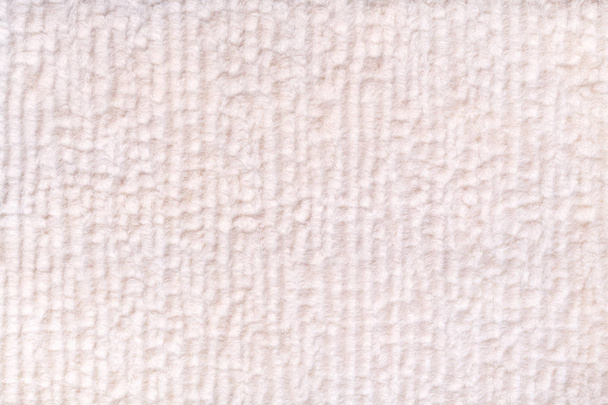 White pearl fluffy background of soft, fleecy cloth. Texture of textile closeup. - Photo, Image