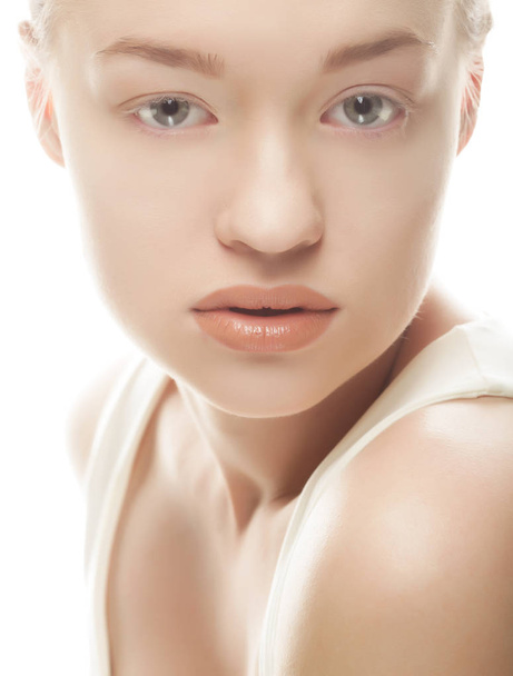 Beautiful woman face with clean skin - isolated on white - Valokuva, kuva