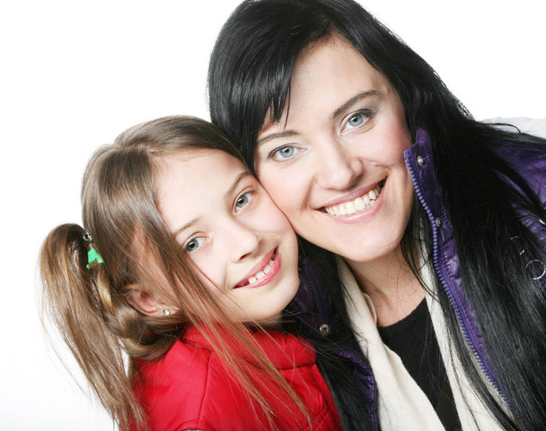 mother and her daughter smiling at the camera - Foto, imagen