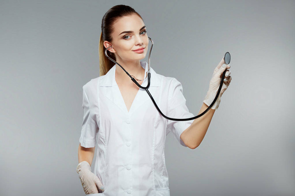 Beautiful nurse wearing stethoscopes - Photo, Image