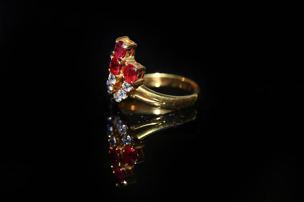 Jewellery diamond ring and gemstone on a black background - Photo, Image