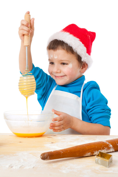 Smiling little boy with egg-beater - Photo, Image