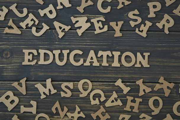 Word education on a wooden background - Foto, Bild