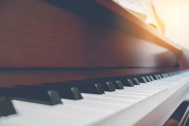 Piano keyboard background with selective focus. vintge filter - Фото, изображение