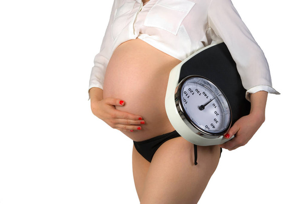 Mujer embarazada de ocho meses y medio
 - Foto, imagen