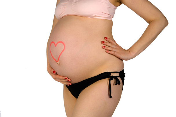 Osm a půl měsíce těhotná žena - Fotografie, Obrázek