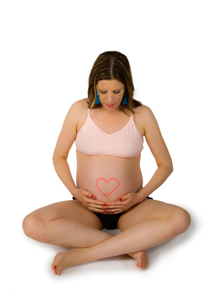 Donna incinta di otto mesi e mezzo
 - Foto, immagini