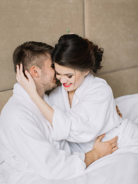 man and woman embrace in bed  - Photo, Image
