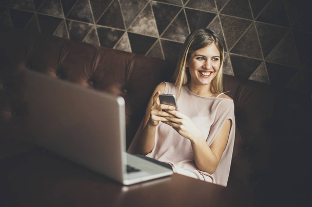 Young freelancer woman with laptop - Photo, image