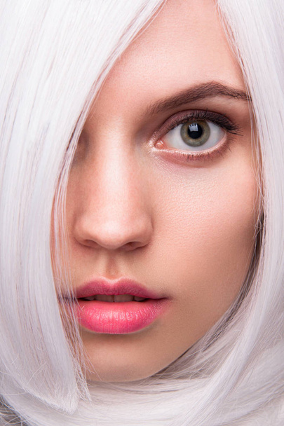 (Portrait of a young beautiful woman with creative makeup and white wig in studio  - Φωτογραφία, εικόνα