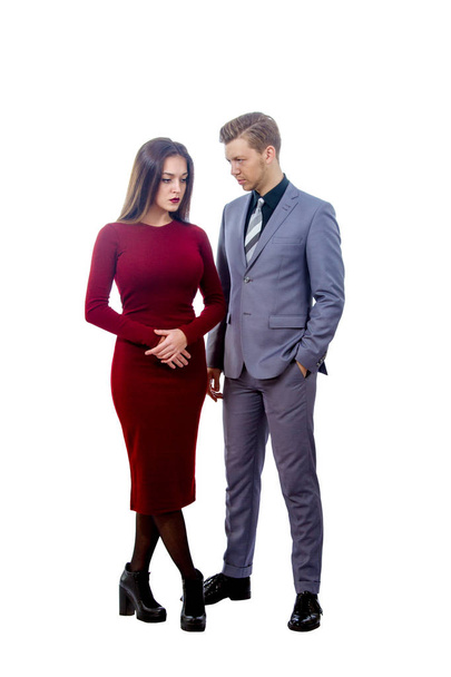 sad girl in red dress and resentful guy - Foto, afbeelding