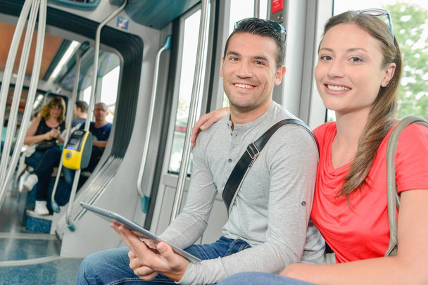 Couple on public transport - Фото, зображення