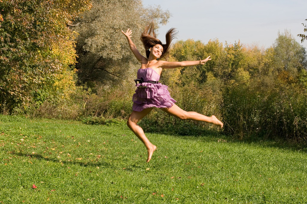 Joyful girl having fun outdoor - Fotoğraf, Görsel
