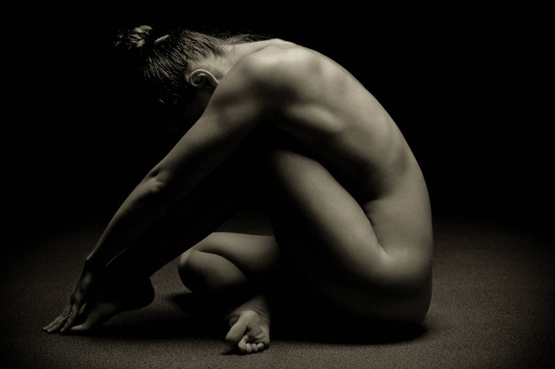 Naked woman body sculpture. Fine art photo of female body. - Fotó, kép