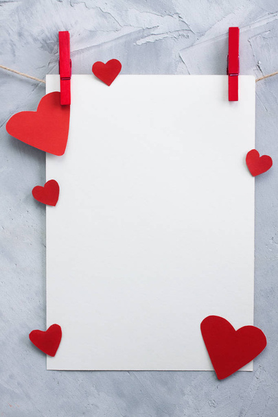 Valentine, love background with paper and hearts on a rope - Фото, изображение